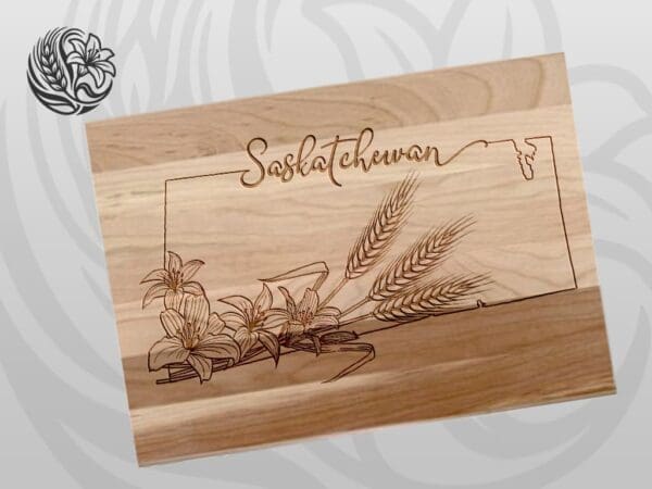 Saskatchewan signature cutting board made from Canadian maple with laser-engraved prairie lily and wheat design