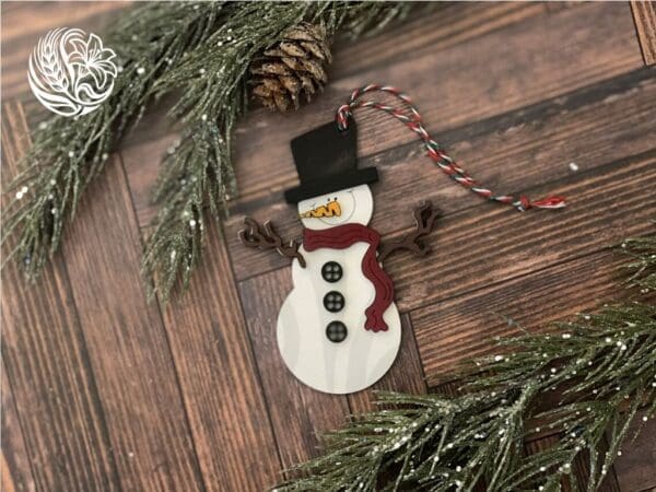 handcrafted wooden snowman ornament